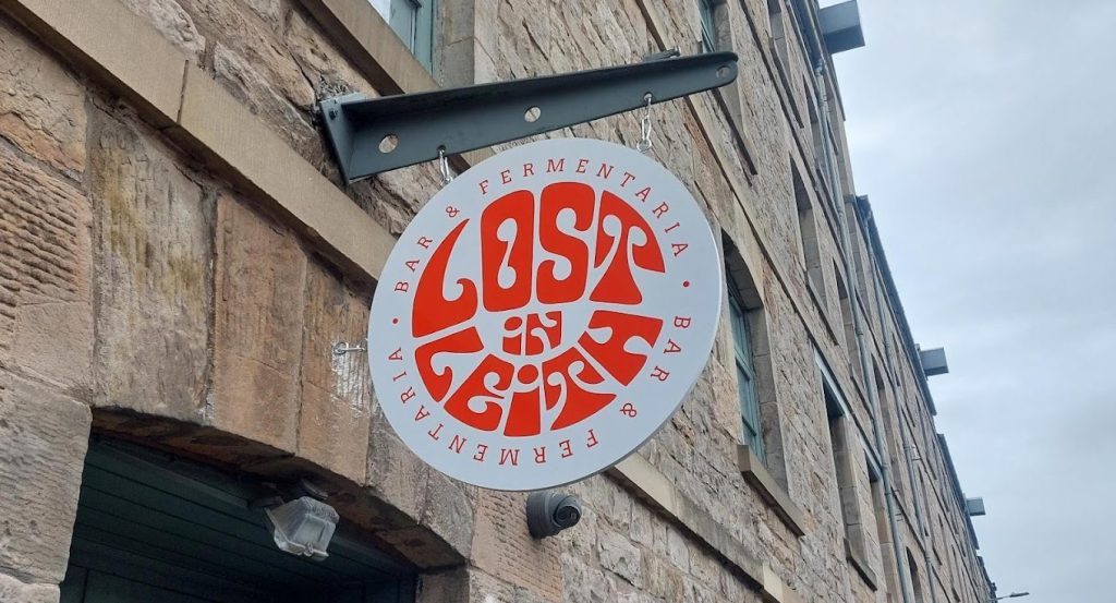 circular projecting sign for bar and fermentaria Lost in Leith